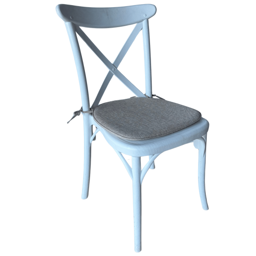 Chaise dos croisé blanche avec coussin écru en lin